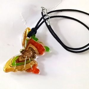 Glass butterfly 🦋  pendant with cord.
